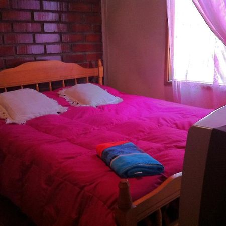 Hostel Melinda Puerto Natales Habitación foto