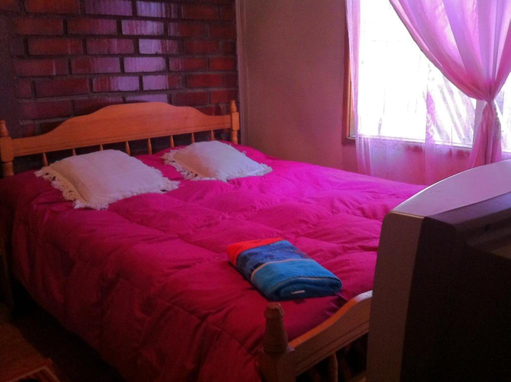Hostel Melinda Puerto Natales Habitación foto