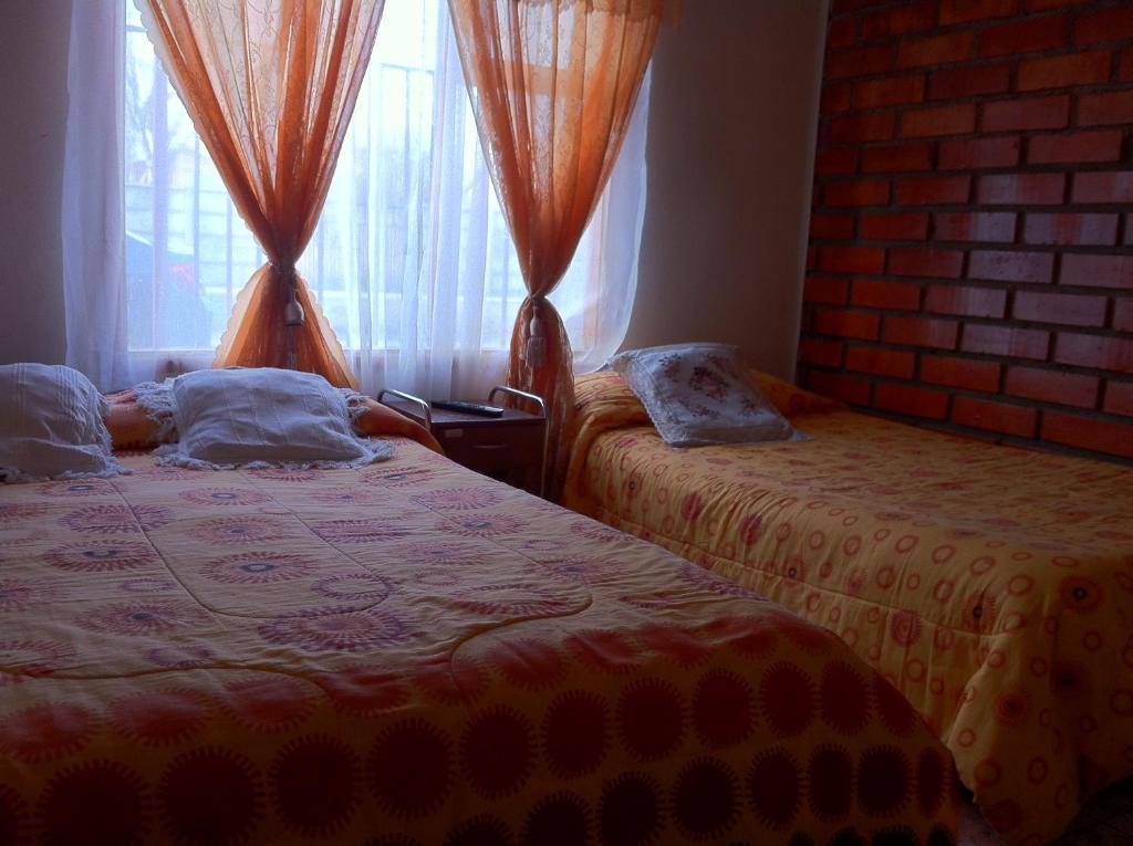 Hostel Melinda Puerto Natales Habitación foto