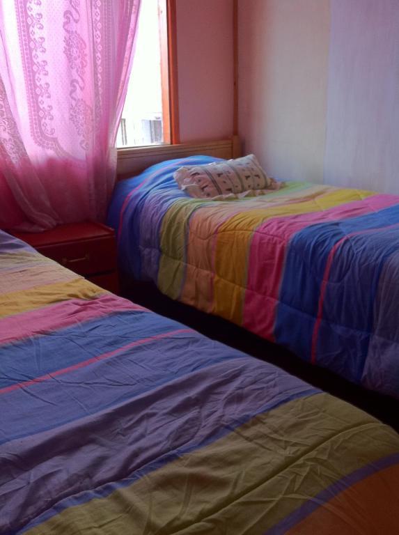 Hostel Melinda Puerto Natales Habitación foto