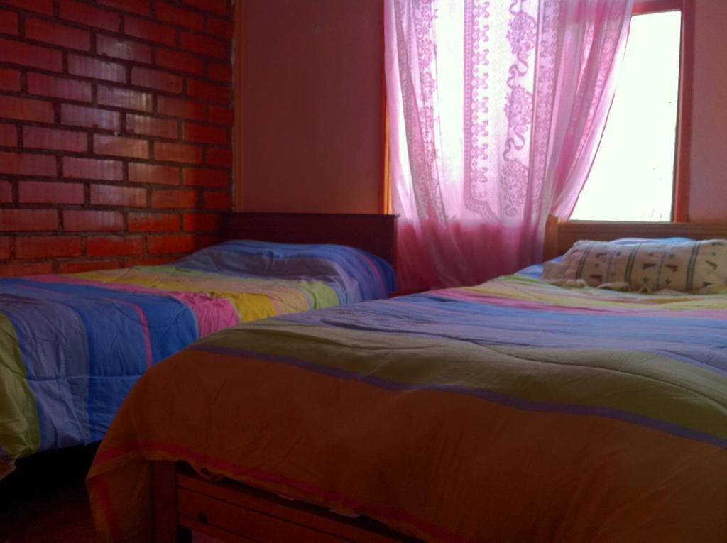 Hostel Melinda Puerto Natales Habitación foto