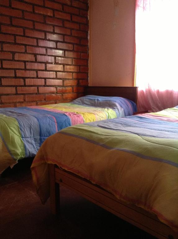 Hostel Melinda Puerto Natales Habitación foto